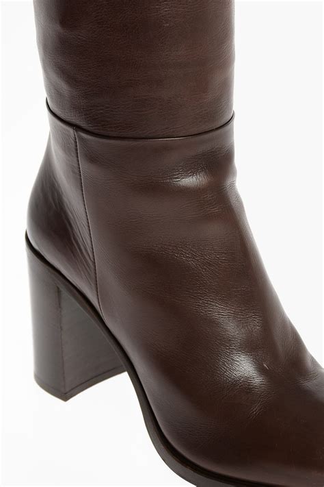 prada over the knee leather boots|Prada chunky heel ankle boots.